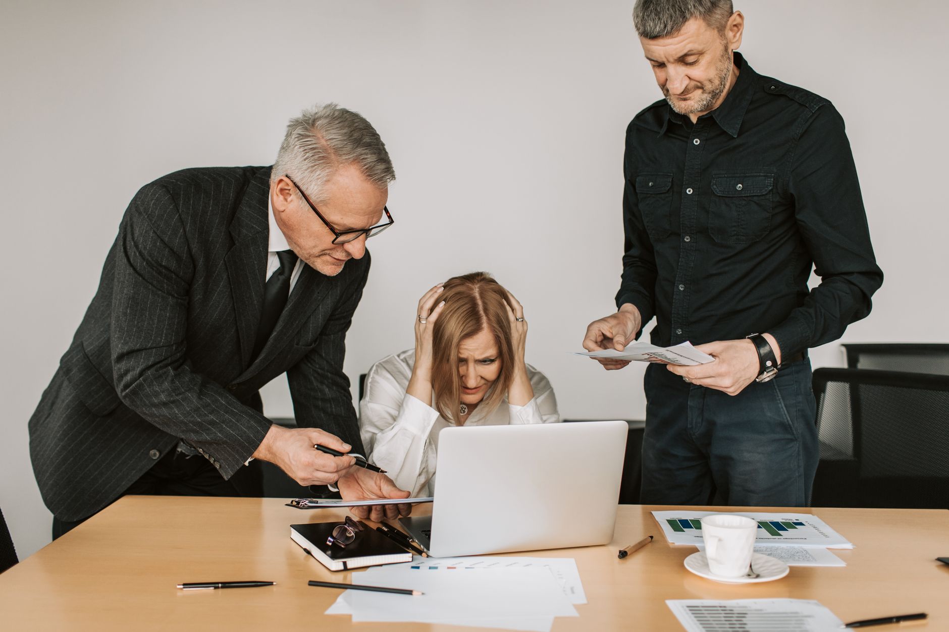 A business crisis meeting room discussing strategic risks